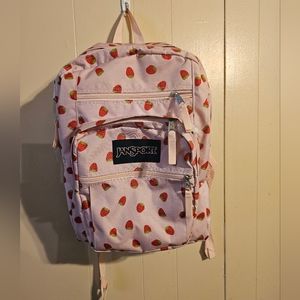 The famous Jansport pink with strawberries backpack!
